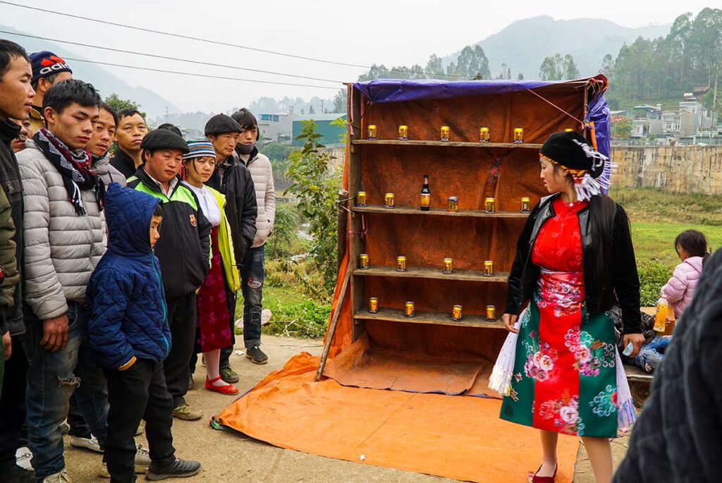 ethnic minority people playing games on the Dong Van Market