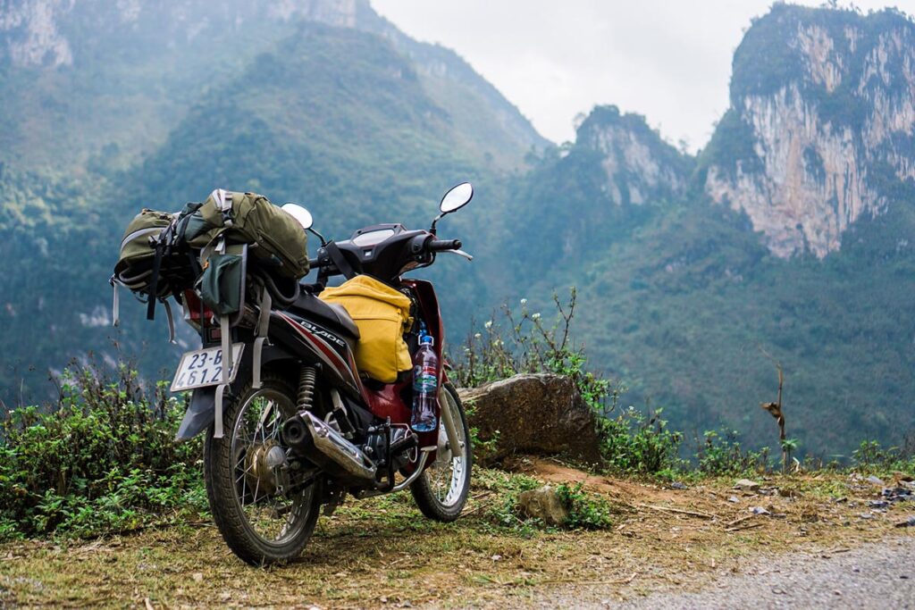 Ha Giang in April with motorbike on a road along the Ha Giang Loop
