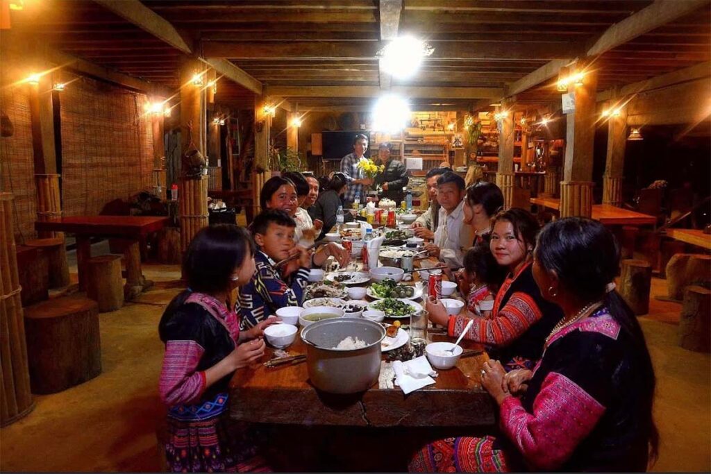 A traditional family dinner in Ha Giang with ethnic minority people