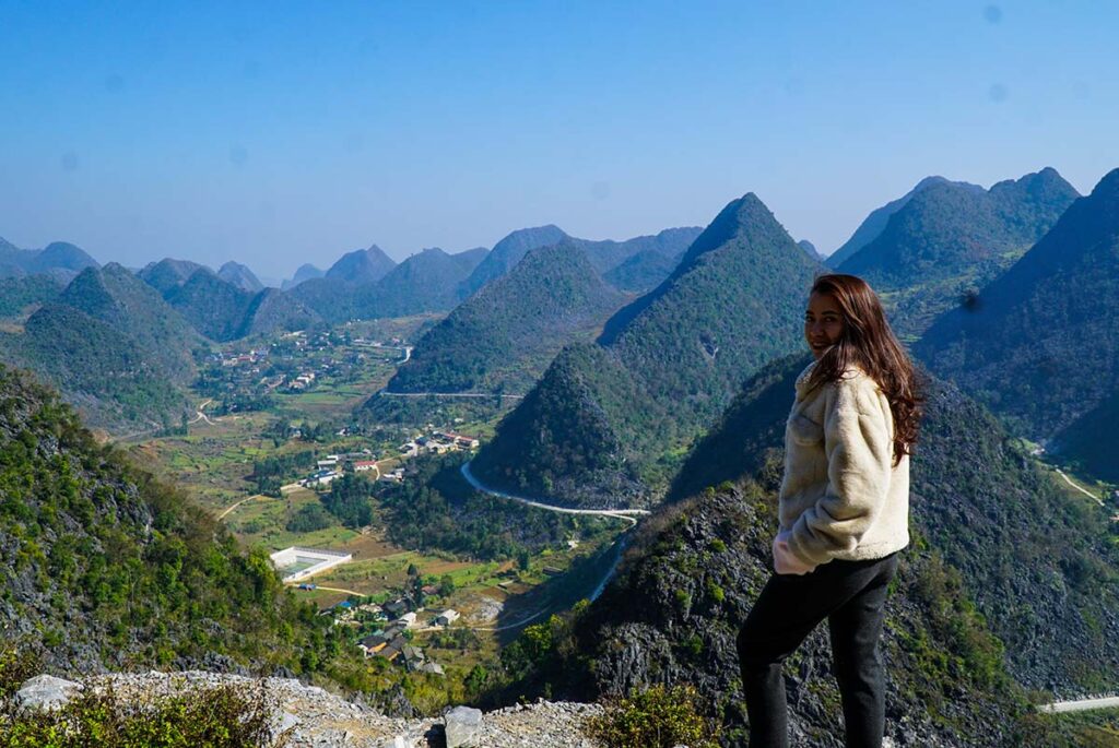 Ha Giang in November with clear sky and woman with warm jacket