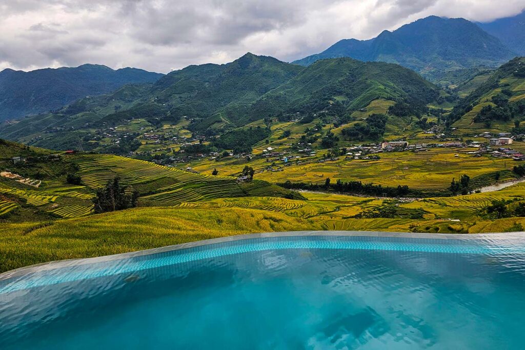 Sapa infinity pool with view on terraced rice fields